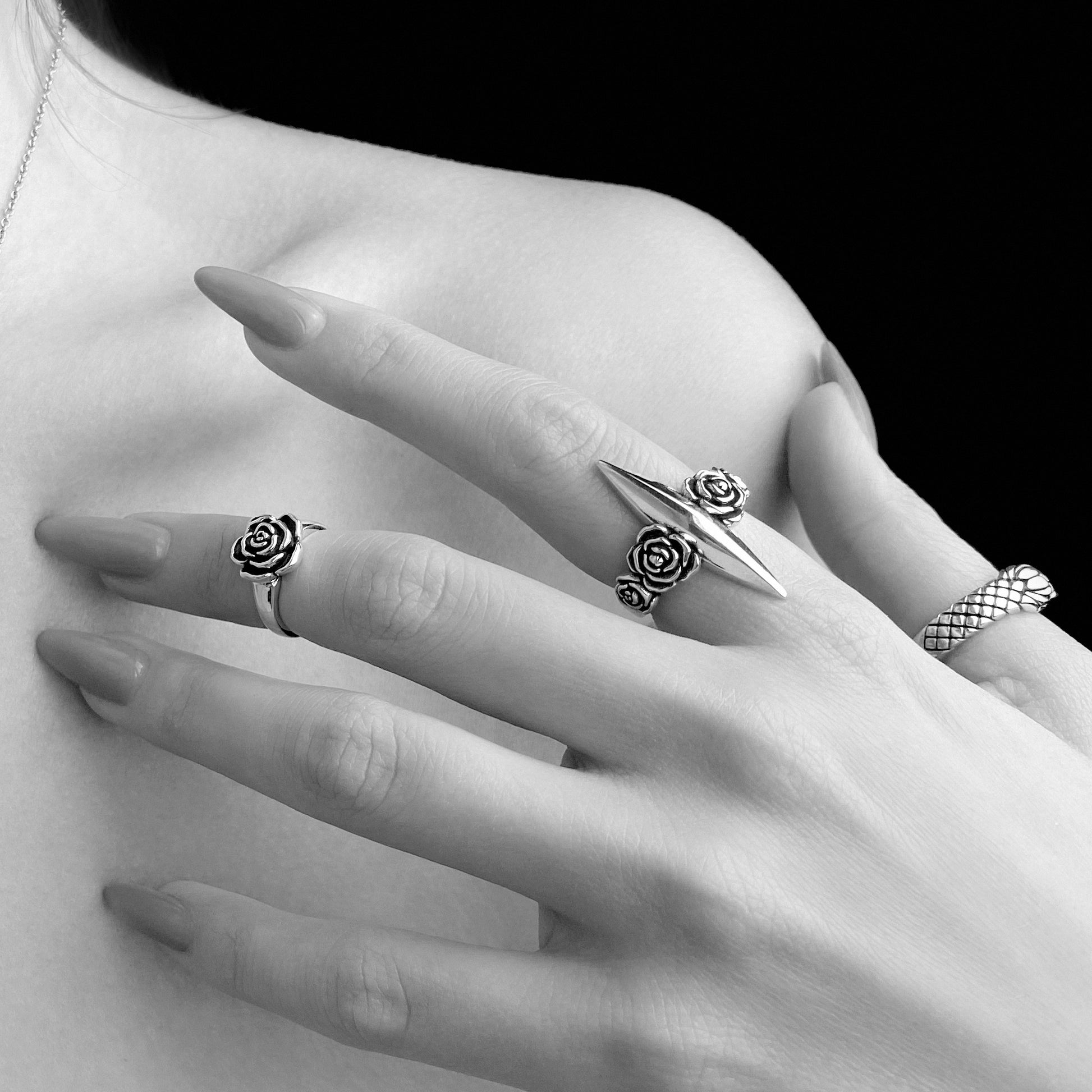 Gothic silver rose rings on model