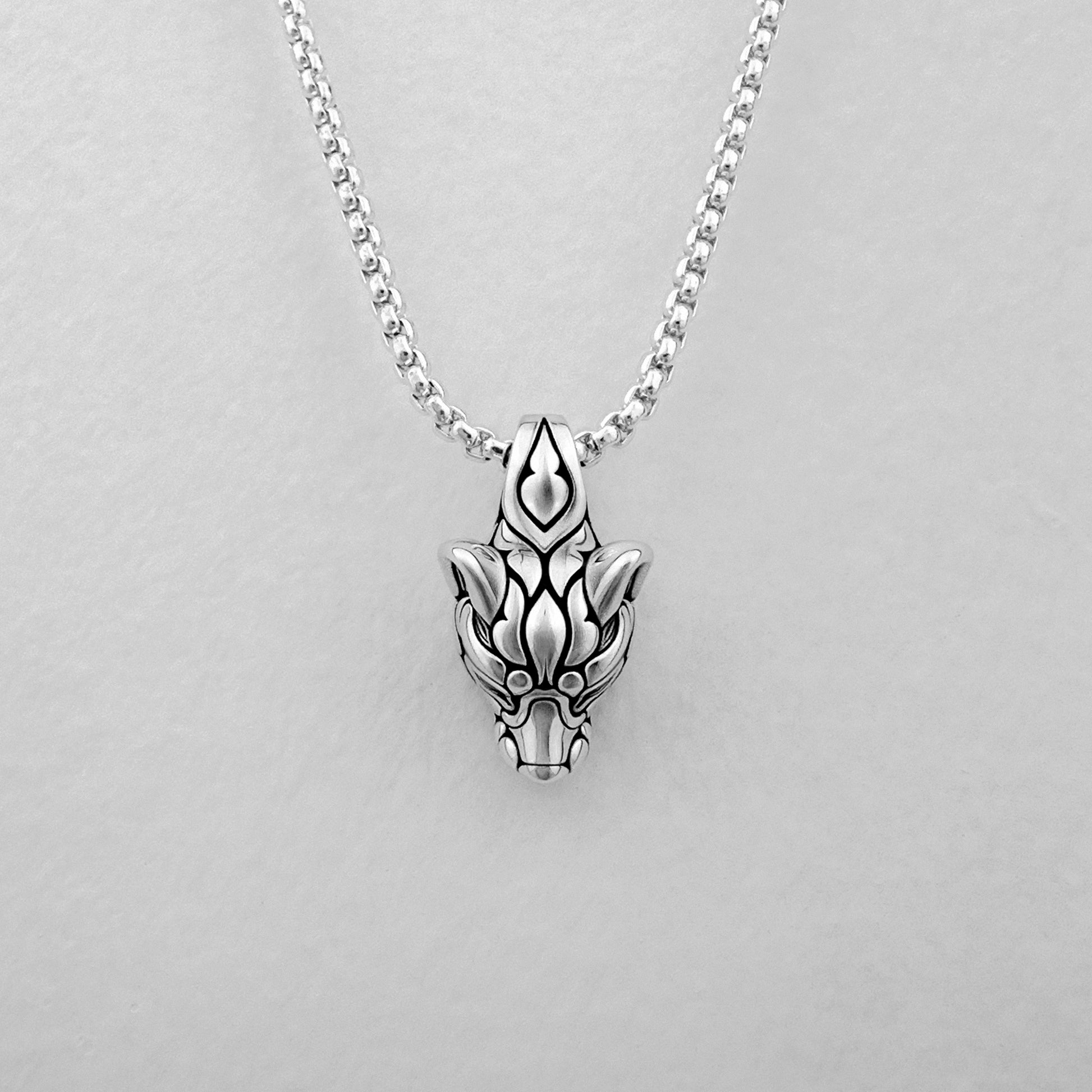 Stylized silver Fox pendant on round box chain