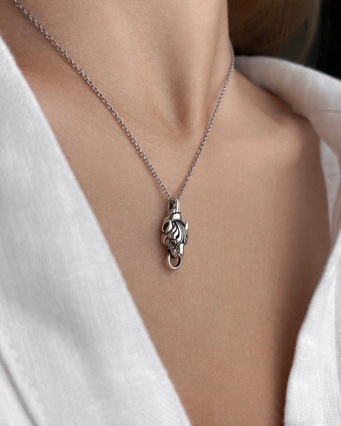 Edgy and elegant wild cat silver knocker pendant