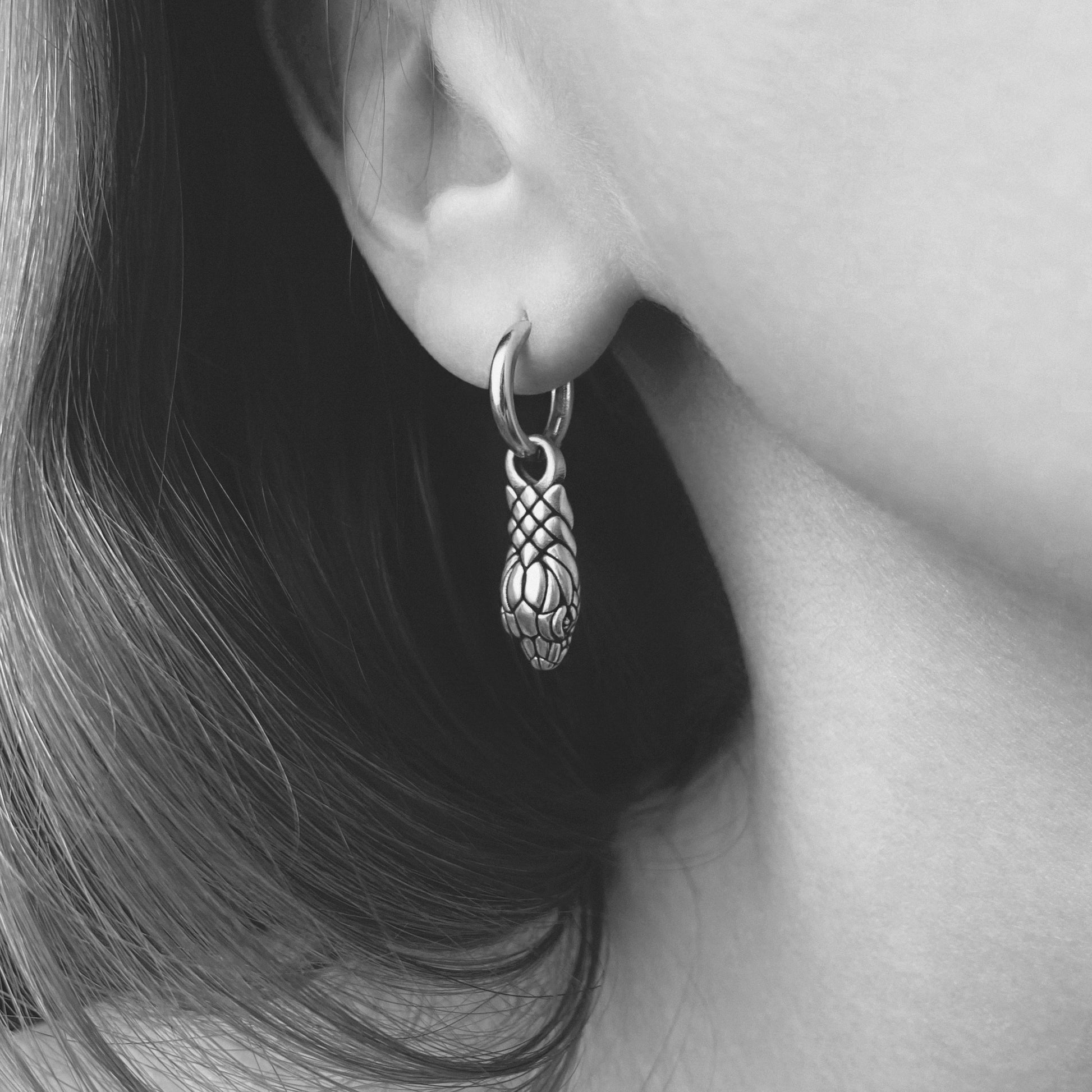 Witchy silver shake head dangle earring