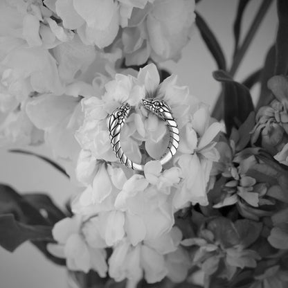 Sterling Silver open ring featuring two snake heads facing each other